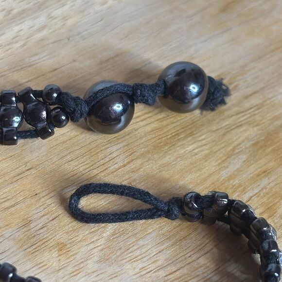 Black corded bracelet with white silver tone rhinestones with beaded closure - Picture 5 of 6